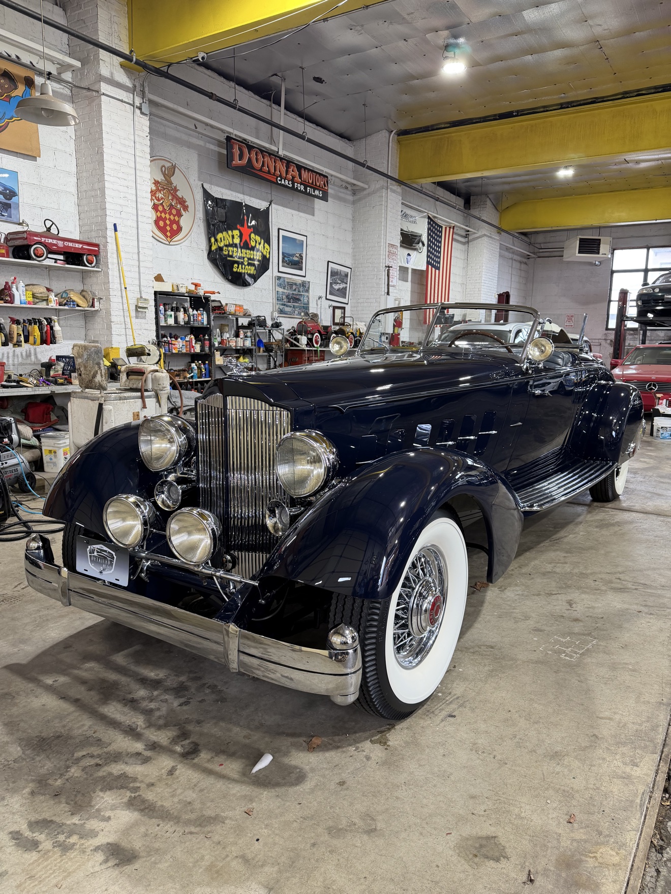Dark blue vintage convertible after detailing