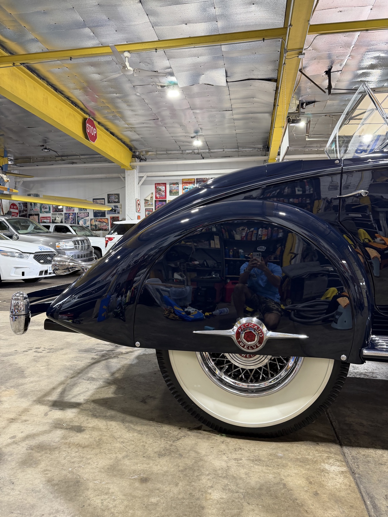 Close-up of the Packard Twelve badge on the front fender