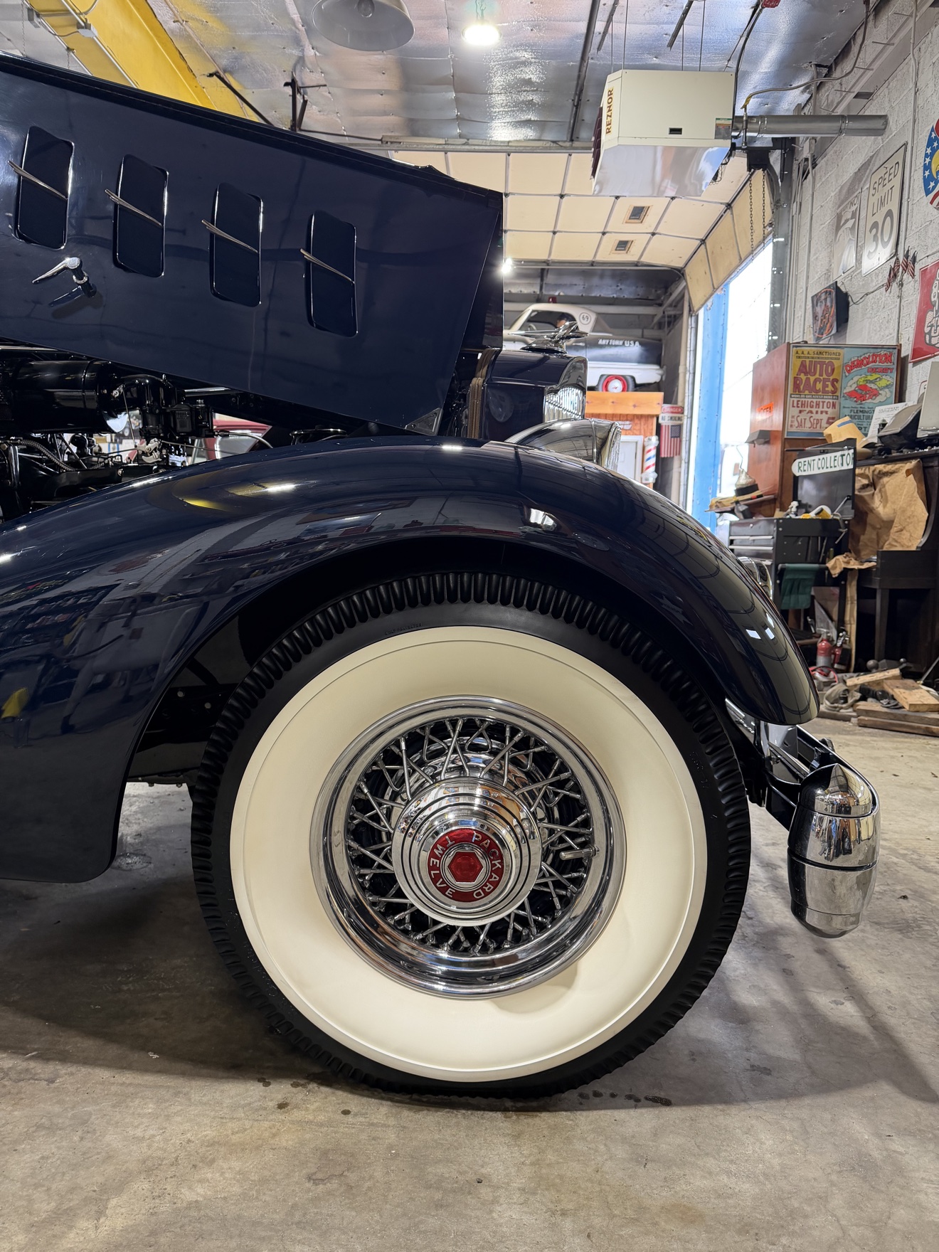 Close-up of the 1934 Packard Twelve wire wheel with whitewall tire