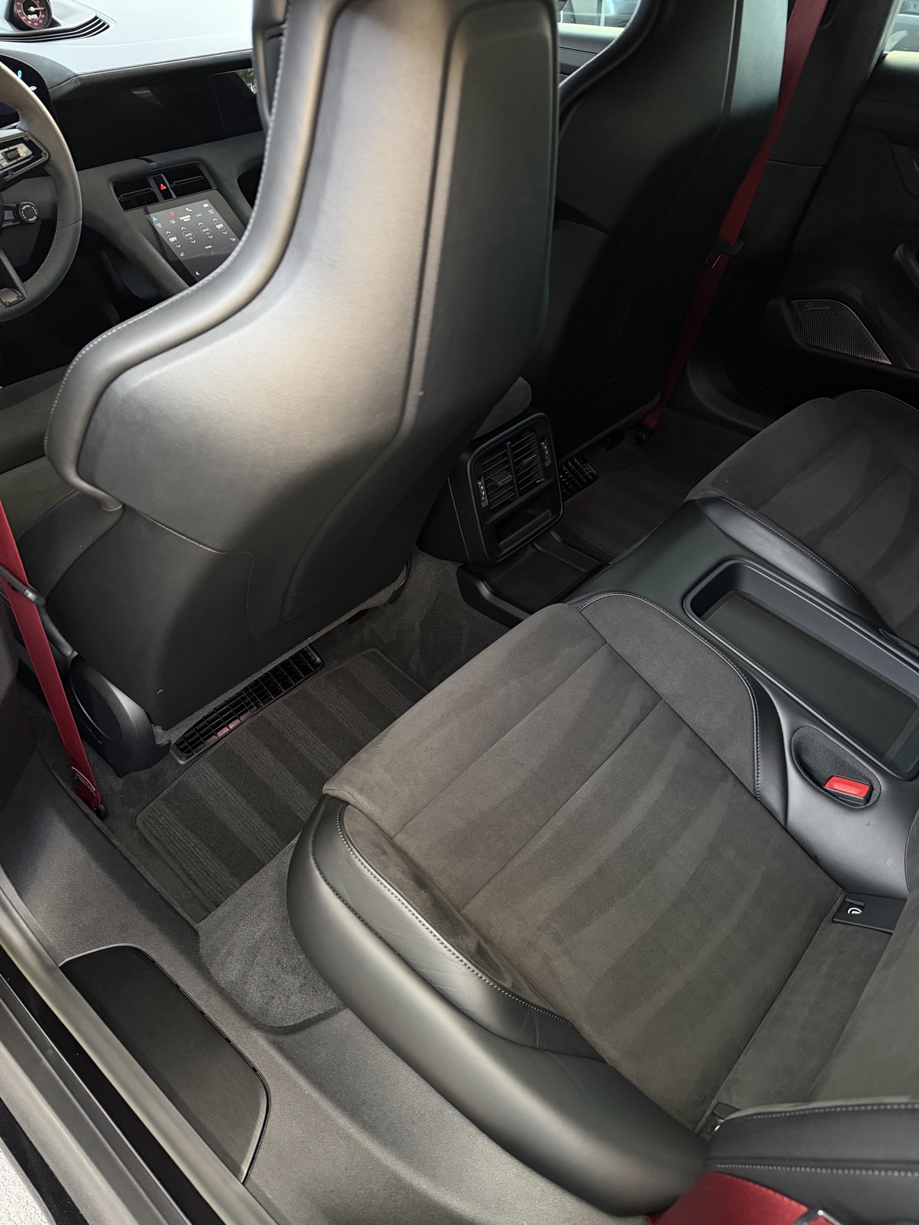 Porsche Taycan GTS rear seats from behind the front seats