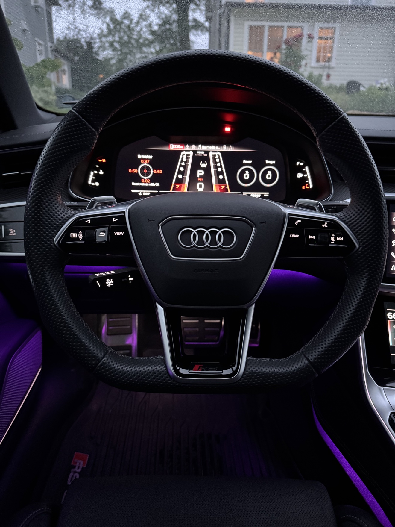 Close-up of the steering wheel with RS badge in an Audi RS6 Avant