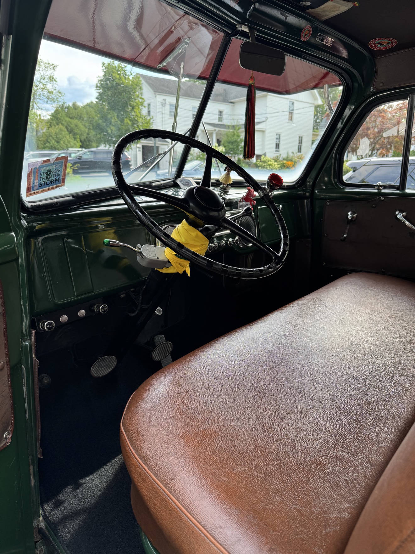 Dodge B-Series “Pilothouse” Pickup driver cockpit with brown bench seat after detailing