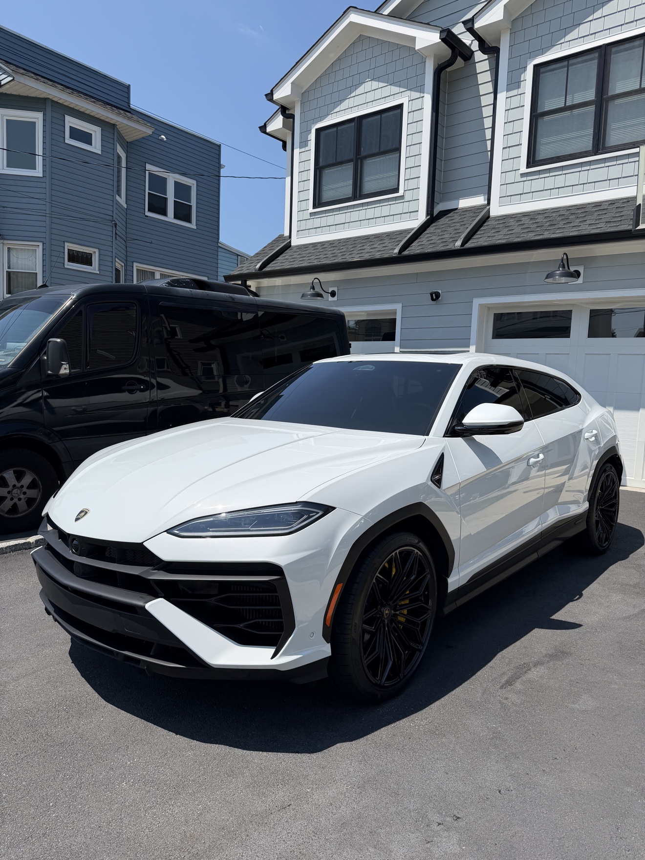 White Lamborghini Urus front angle after detailing
