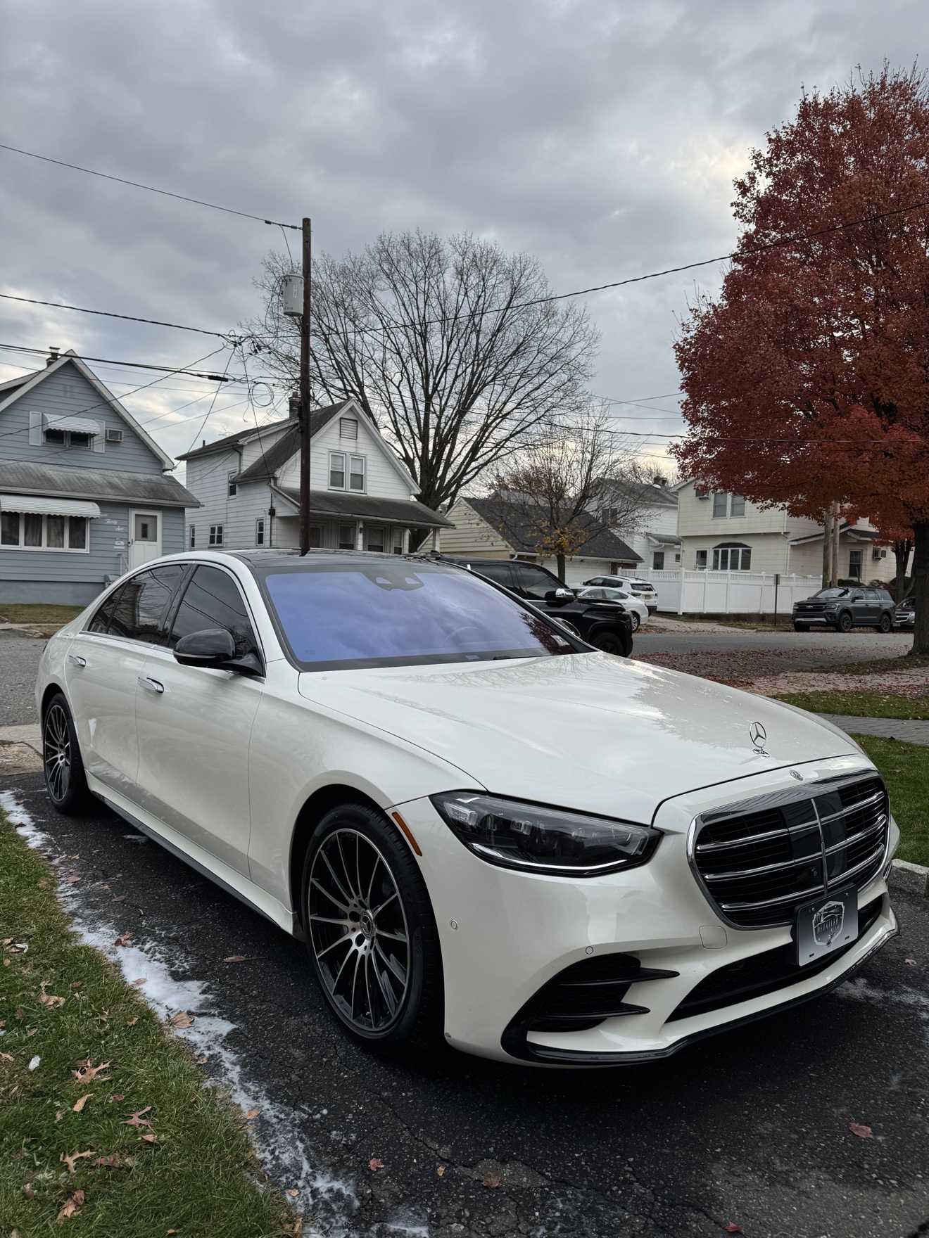 White Mercedes-Benz S580 front three-quarter view after detailing