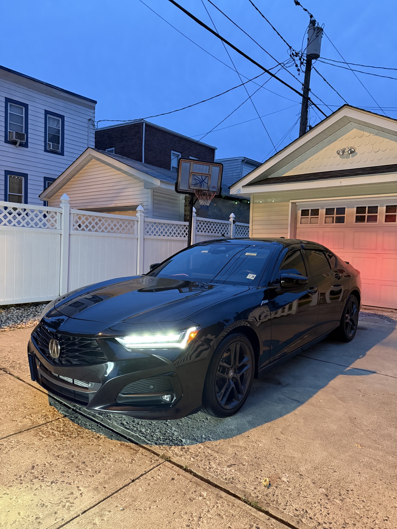 Black Acura TLX SH-AWD A-Spec sedan after detailing
