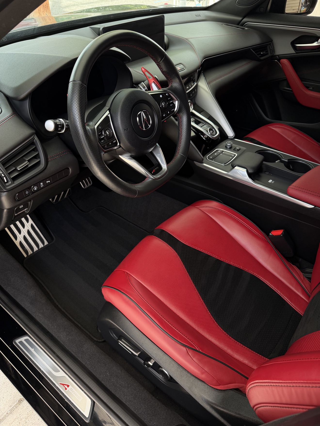 Acura TLX SH-AWD A-Spec driver cockpit with red and black leather interior and A-Spec sill plate