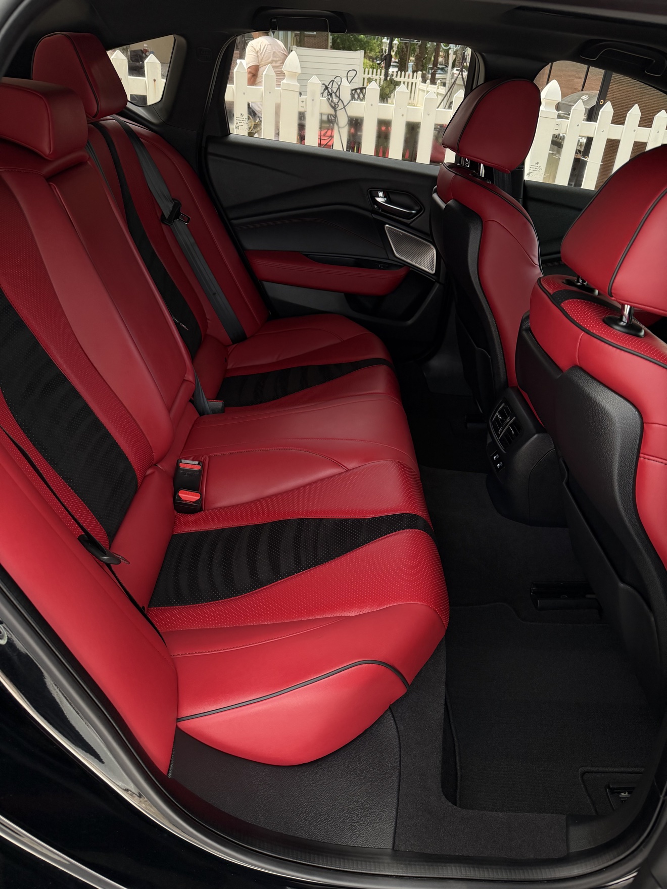 Acura TLX SH-AWD A-Spec rear cabin with red and black leather seats