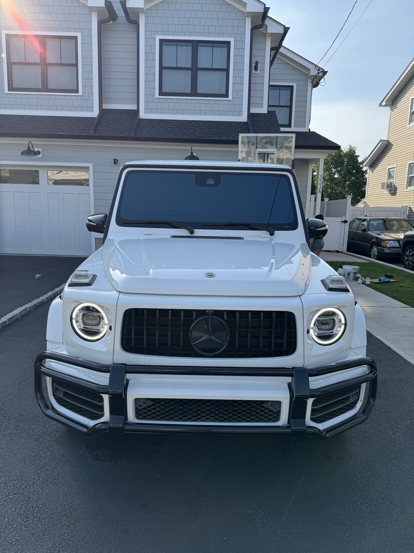 White Mercedes-AMG G 63 front view after detailing