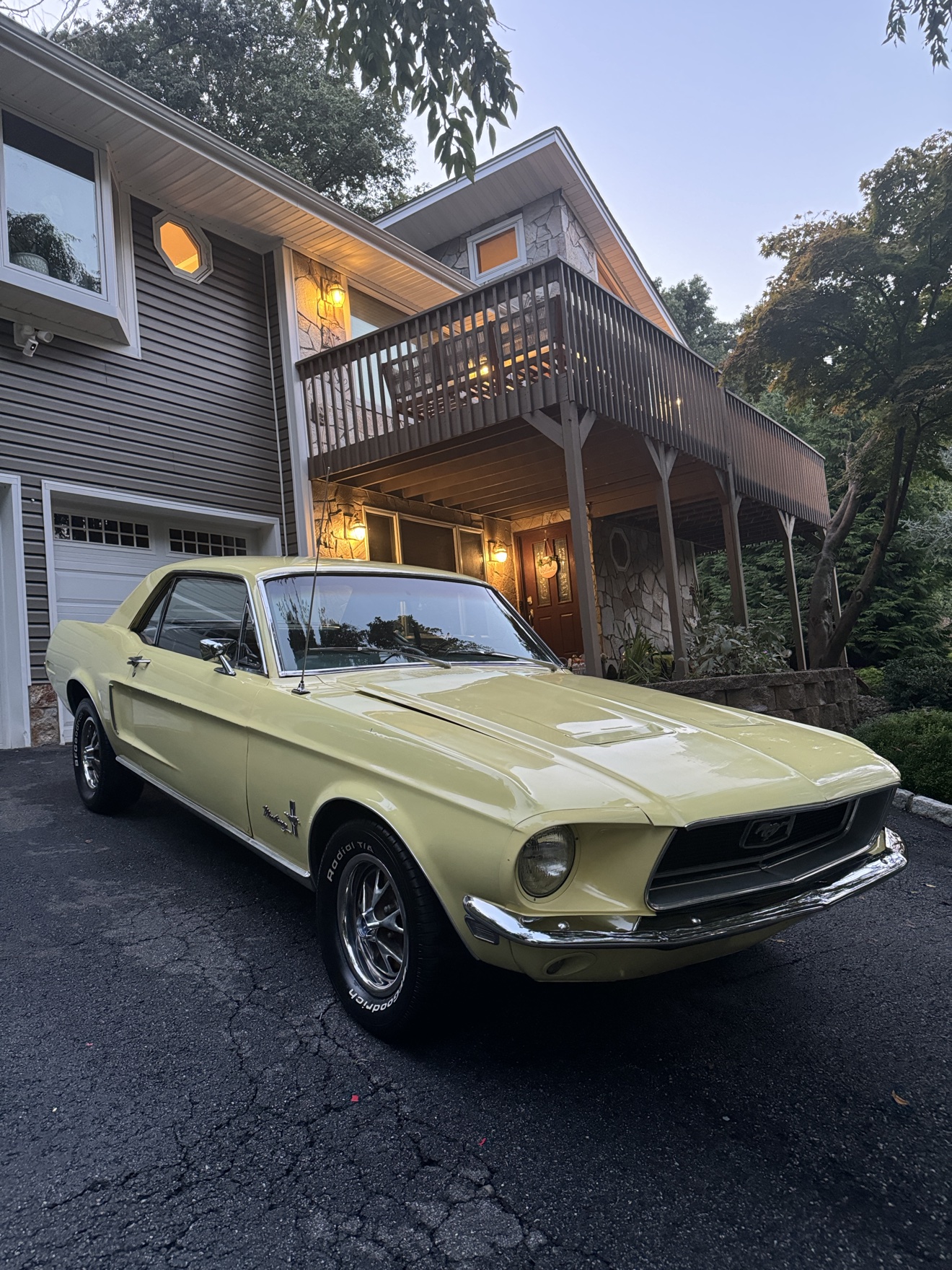 Pale yellow 1968 Ford Mustang coupe after detailing