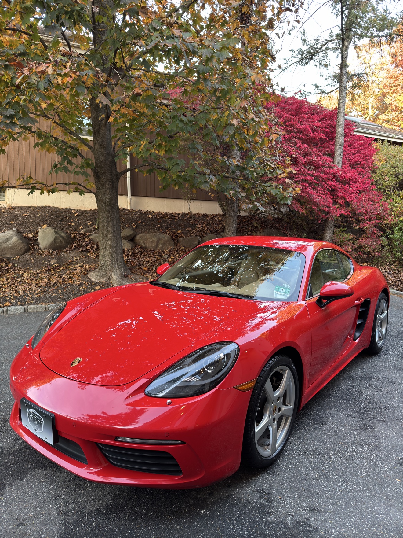 Red Porsche 718 Cayman after detailing